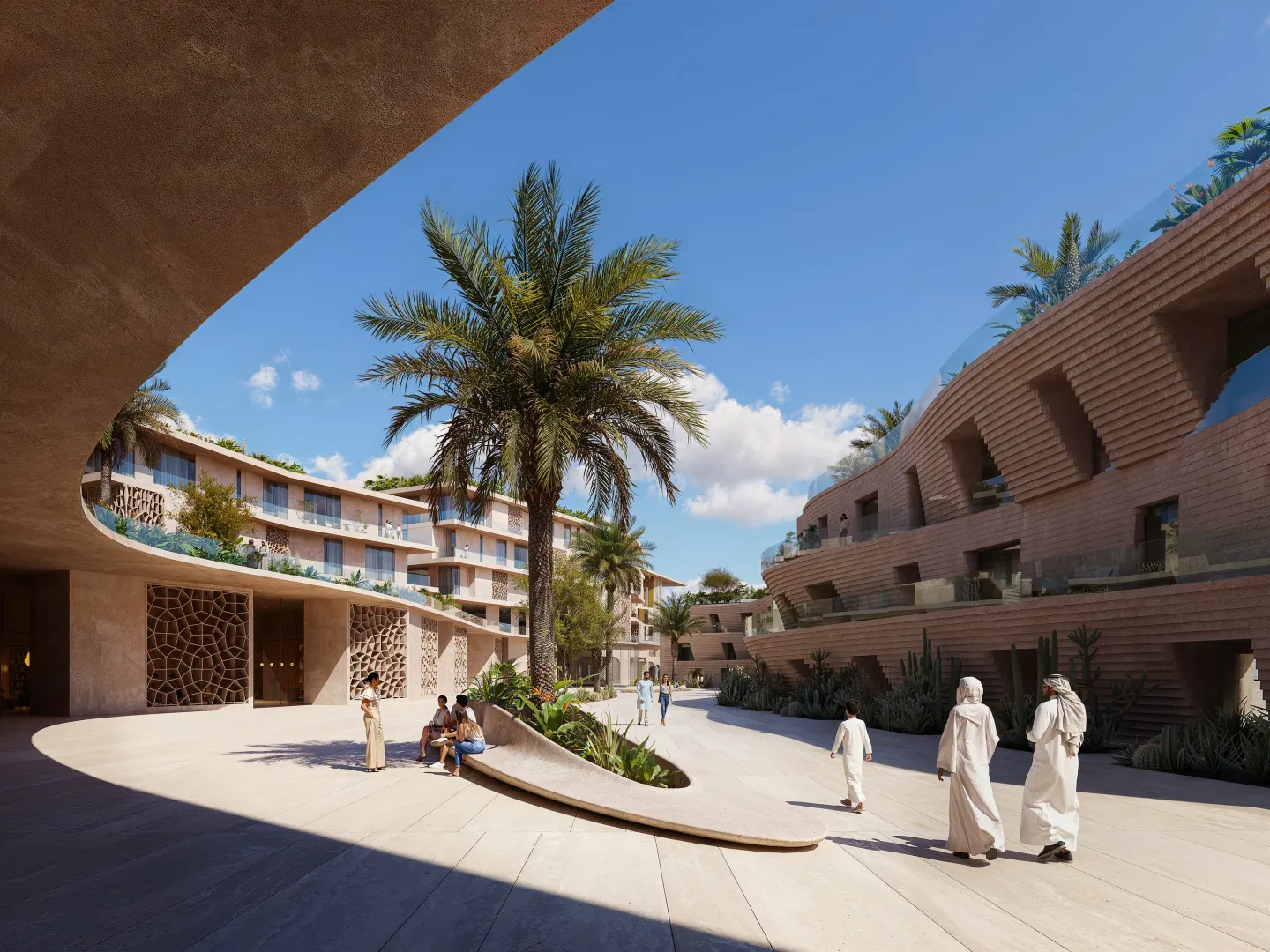 A landscaped podium courtyard at Mira Coral Bay, with palms and coral-stone facades