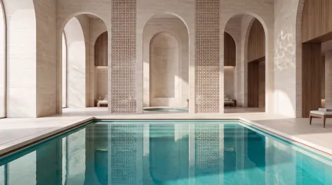Der Bewohner-Pool von Richmond Residences, Mira Coral Bay in einer Halle mit Steinbögen